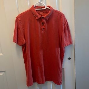 Large orange soft wash polo from Banana Republic.